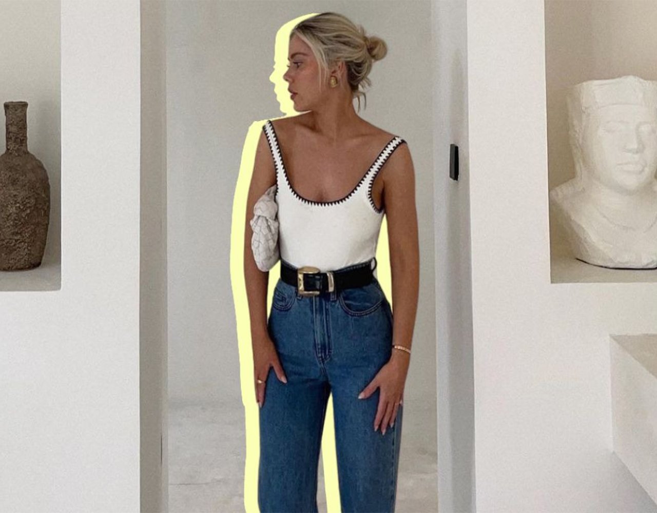 The only top you need this summer is a white tank top - here's how to style it